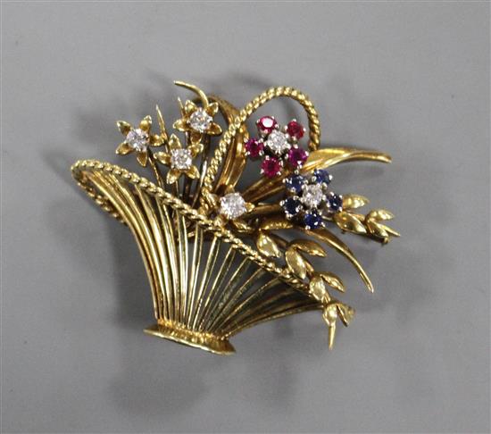 A 1960s 14ct gold, ruby, sapphire and diamond set giardinetto (basket of flowers) brooch, 4cm, gross 13.1 grams.